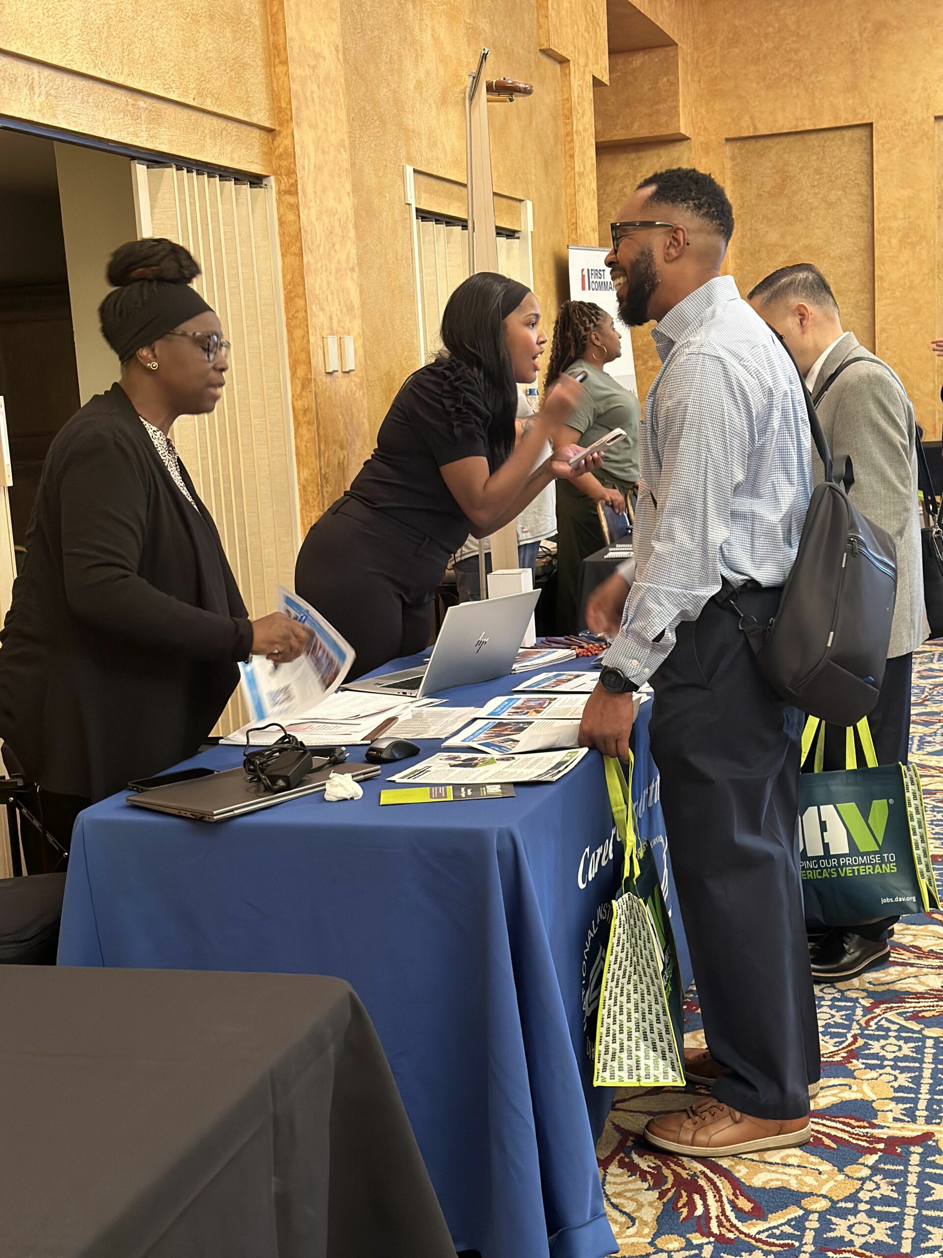 candidate interacting with employer in a career fair